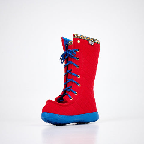 2. Red quilted boot with blue sole and laces, angled view, showing decorative trim and open top