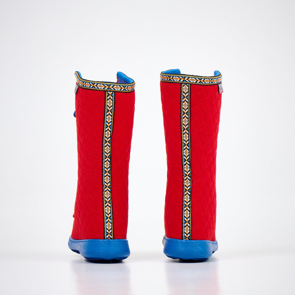 1. Back view of Nesna Lobben Polar Lobben Felt Boots in red with blue soles, showcasing unique design and decorative trim