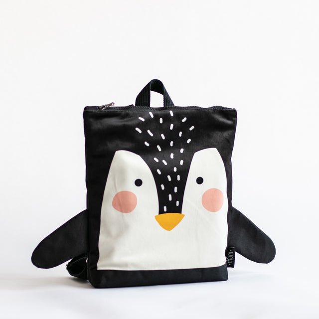 4. Studio image of Muni Penguin backpack with velvet and polyester design