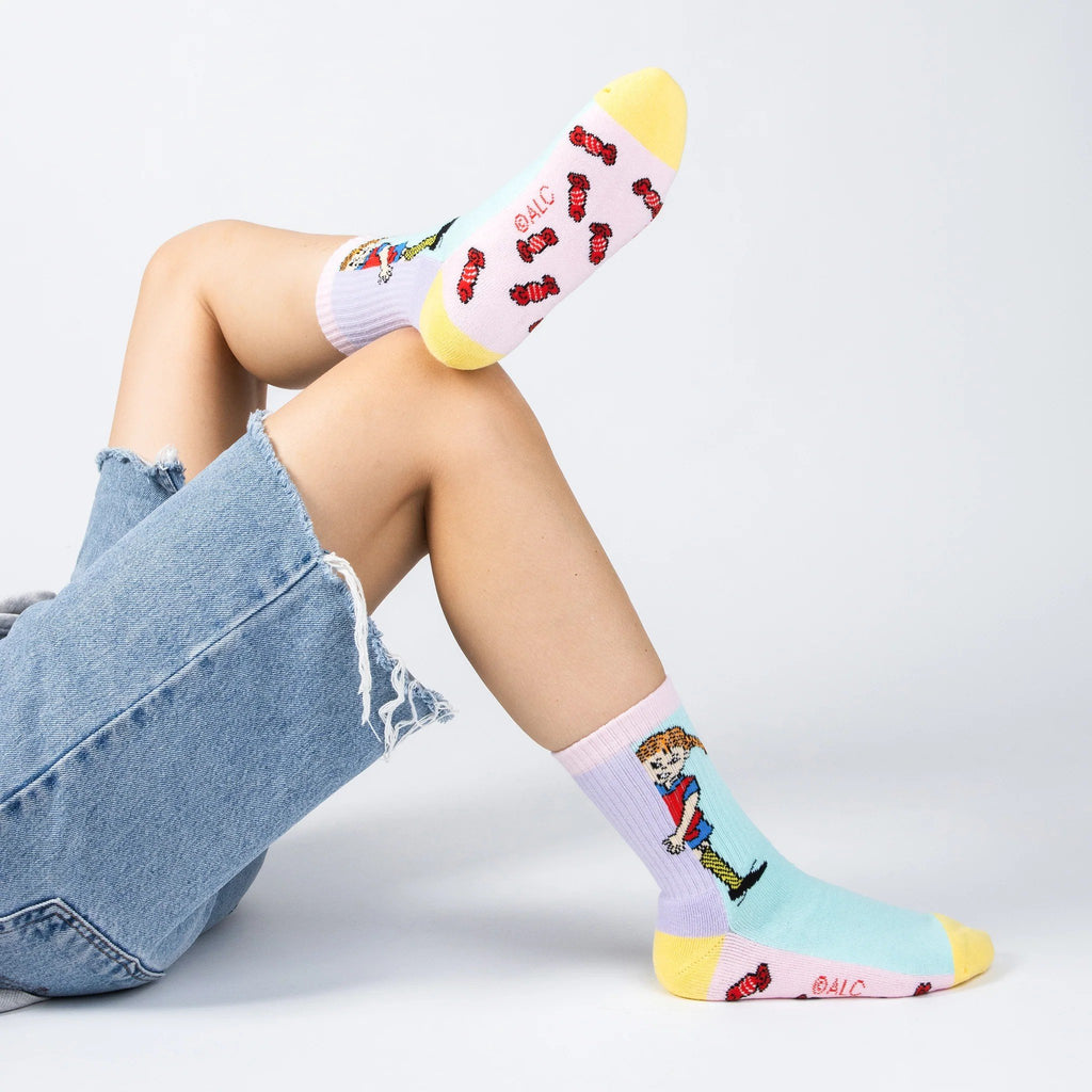1. Women's Pippi Longstocking multicolor socks by NordicBuddies, worn by model in casual setting