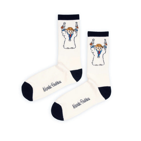 2. Studio image of men's Pippi Longstocking retro socks by NordicBuddies, showcasing classic white color and playful design