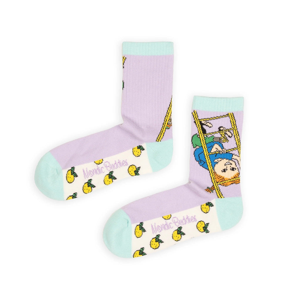 3. Flat lay of women's Pippi Longstocking panel socks by NordicBuddies, highlighting vibrant multicolor design and logo