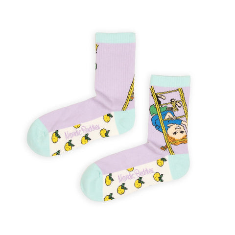 3. Flat lay of women's Pippi Longstocking panel socks by NordicBuddies, highlighting vibrant multicolor design and logo