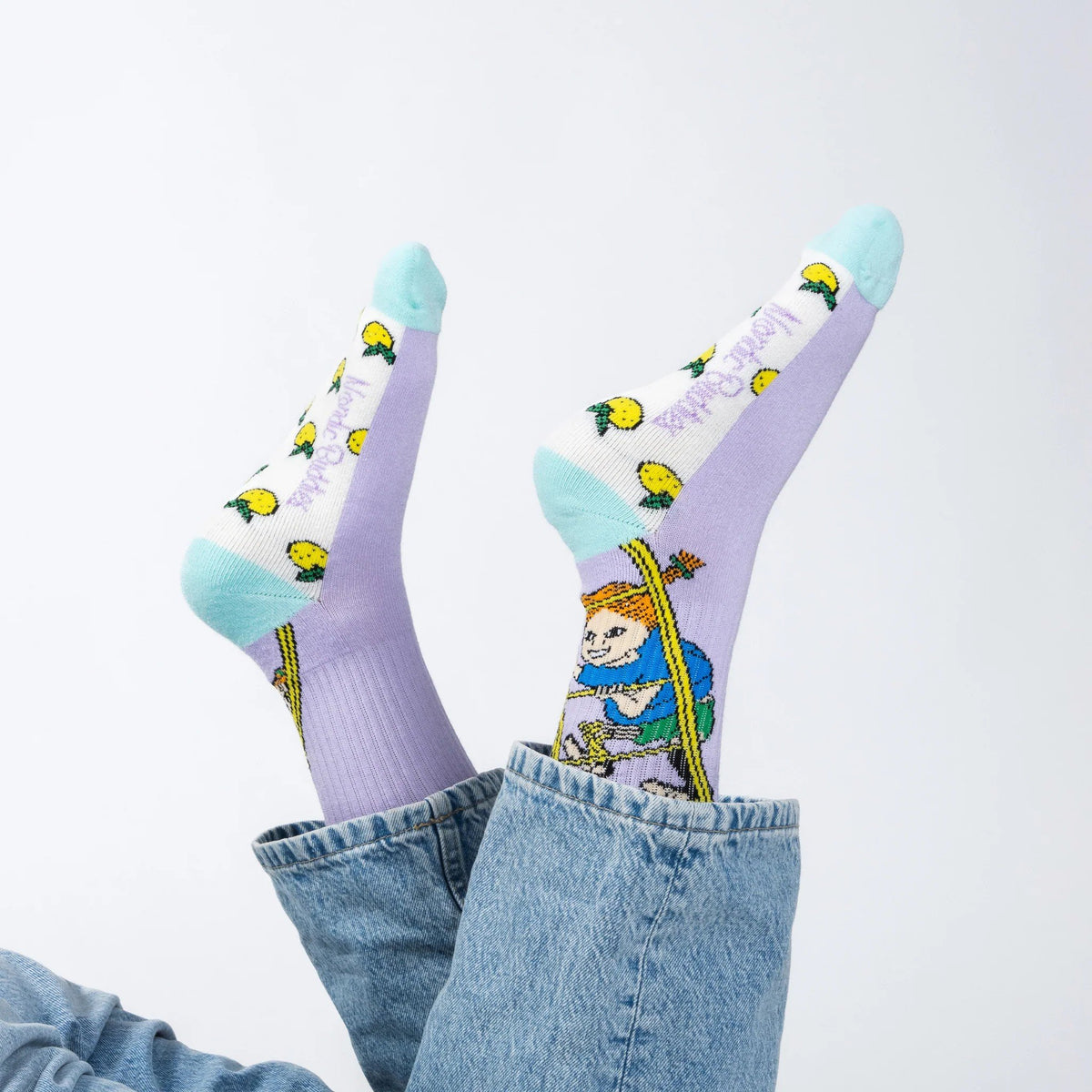 1. Women's Pippi Longstocking panel socks by NordicBuddies, worn with jeans, showcasing vibrant multicolor design