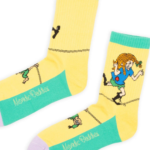 2. Close-up of women's Pippi Longstocking yellow panel socks by NordicBuddies, highlighting colorful design and branding