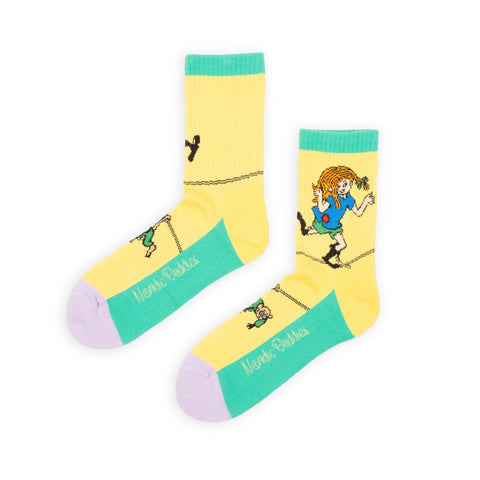 3. Studio shot of women's Pippi Longstocking yellow panel socks by NordicBuddies, showing full design and vibrant colors