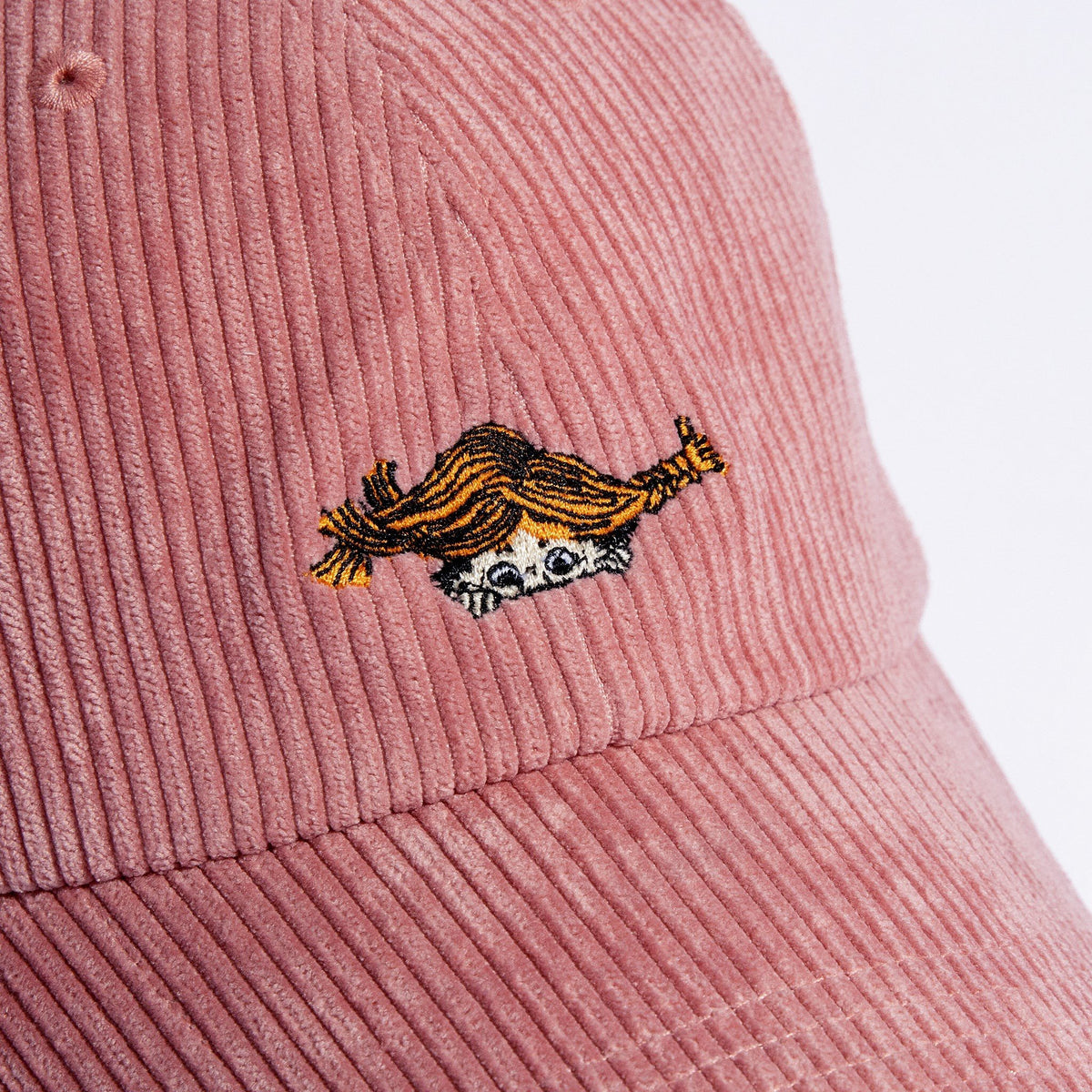5. Close-up of Pippi Longstocking embroidery on pink corduroy dad cap by Moomin