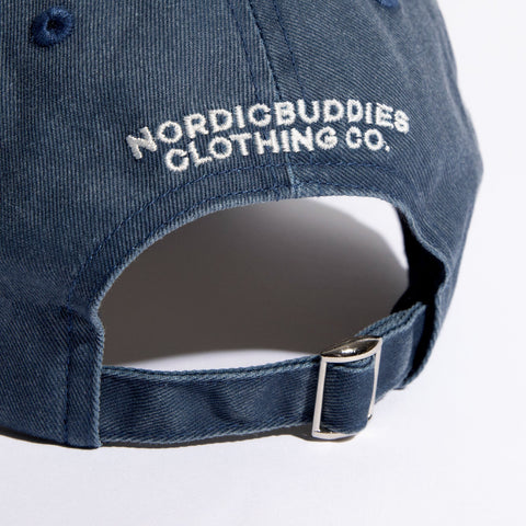 2. Close-up of adjustable strap on Pippi Denim Dad Cap with NordicBuddies branding