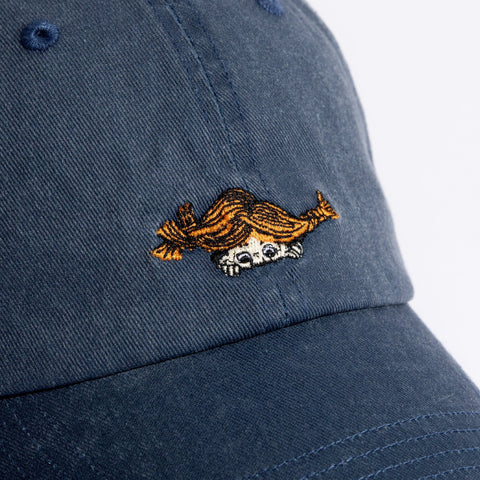 3. Close-up of Pippi Longstocking embroidery on blue denim cap by Moomin