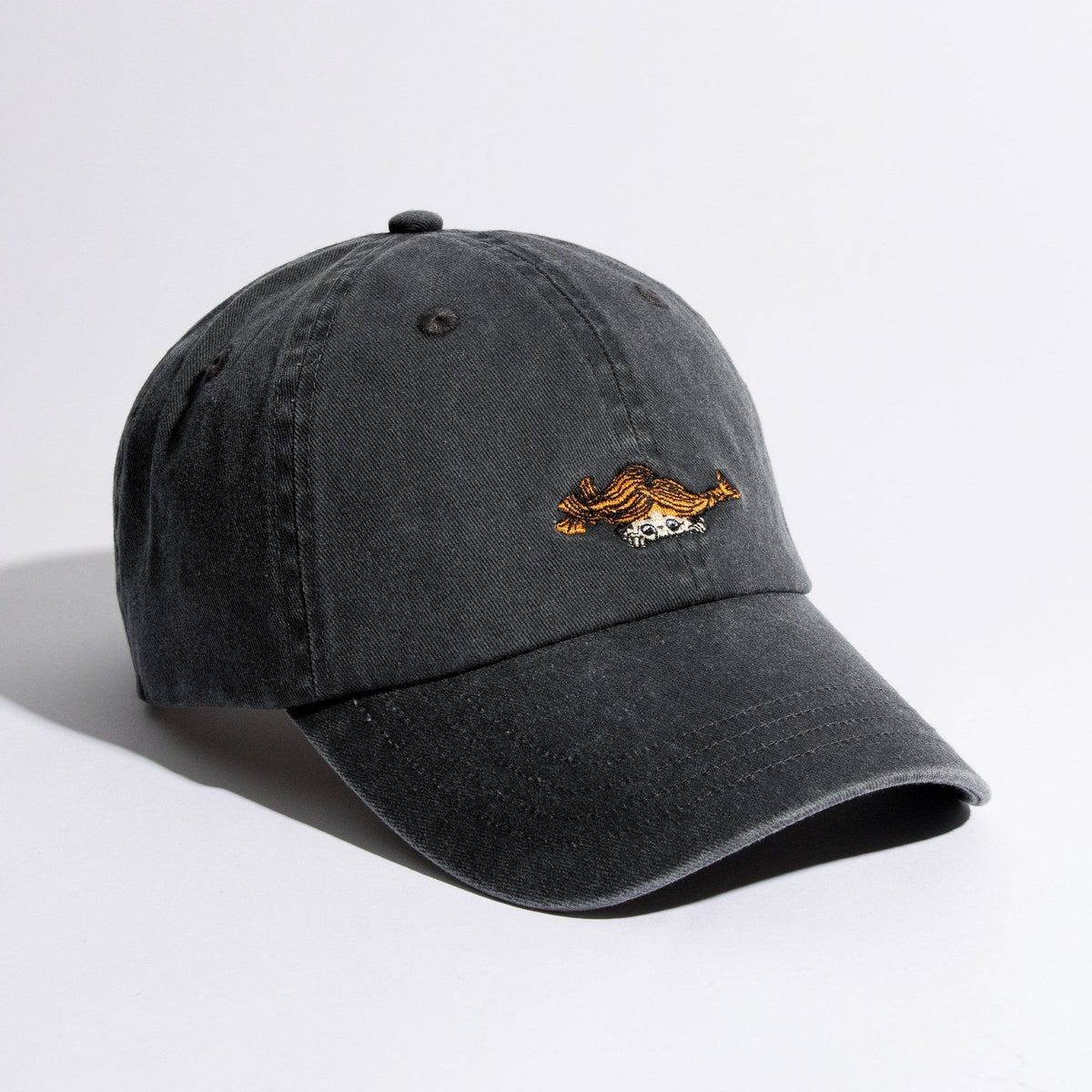 2. Pippi Denim Dad Cap in black by Moomin, studio shot showing front embroidery