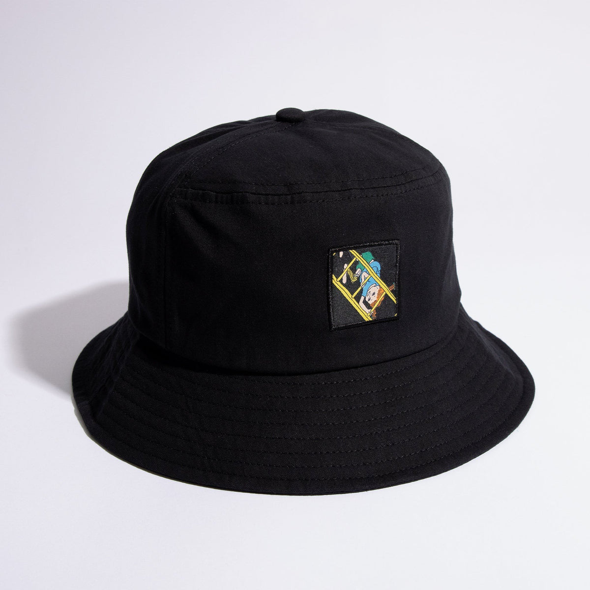 3. Black Pippi Longstocking bucket hat by NordicBuddies with embroidered patch, studio shot