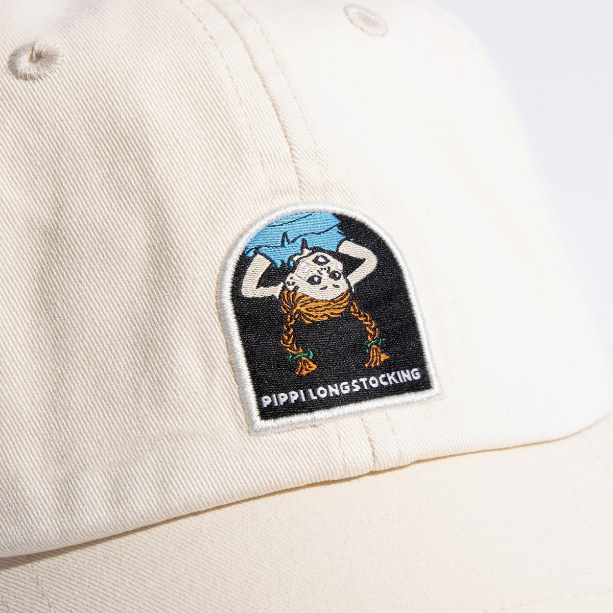 4. Close-up of Pippi Longstocking embroidery on natural white Dad Cap by Moomin