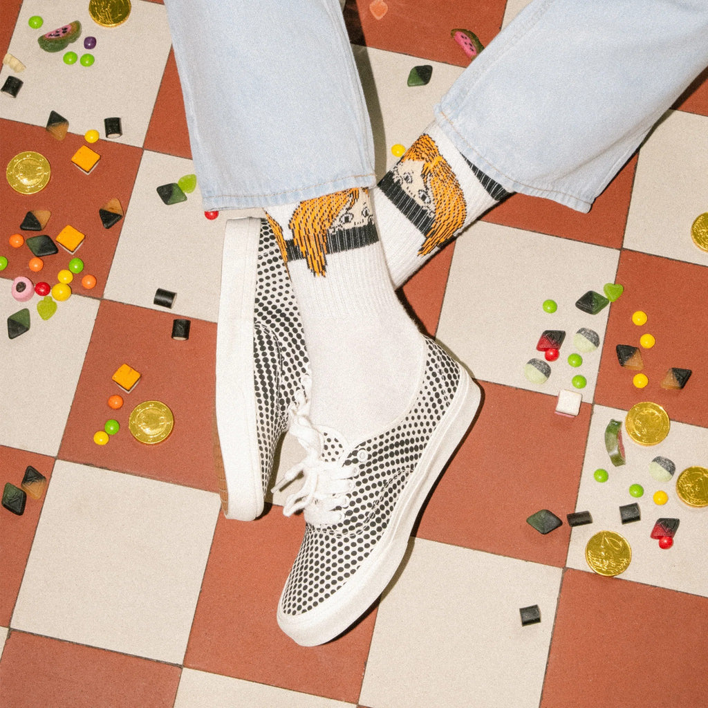 1. Men's Pippi Longstocking retro socks by NordicBuddies in lifestyle setting, worn with casual shoes on checkered floor