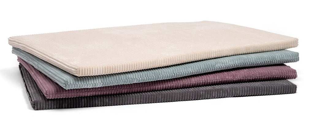 2. Luula play mats stacked in mint green, cannon pink, milky white, and shadow gray