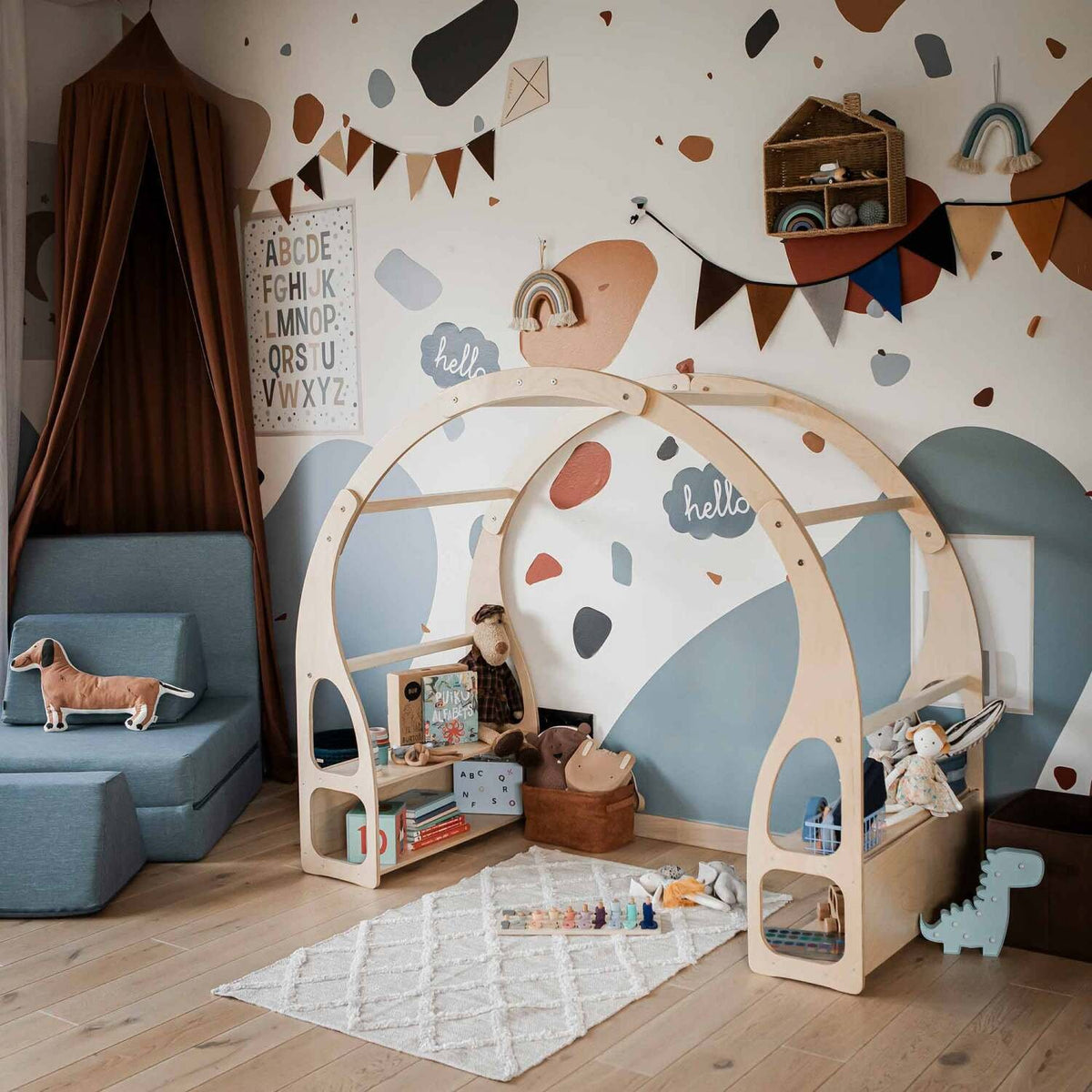 8. Montessori play stand in a decorated children's room with toys and wall art