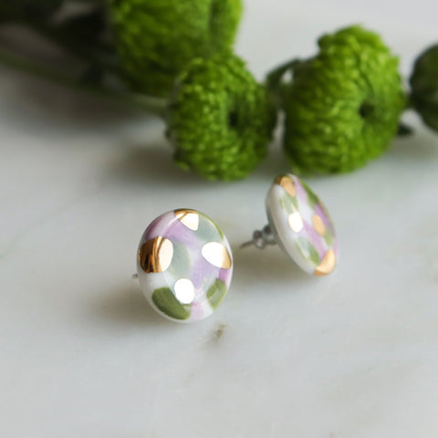 5. Rozenthal Porcelain Tache Studs in green and violet with floral background, featuring 24k gold details