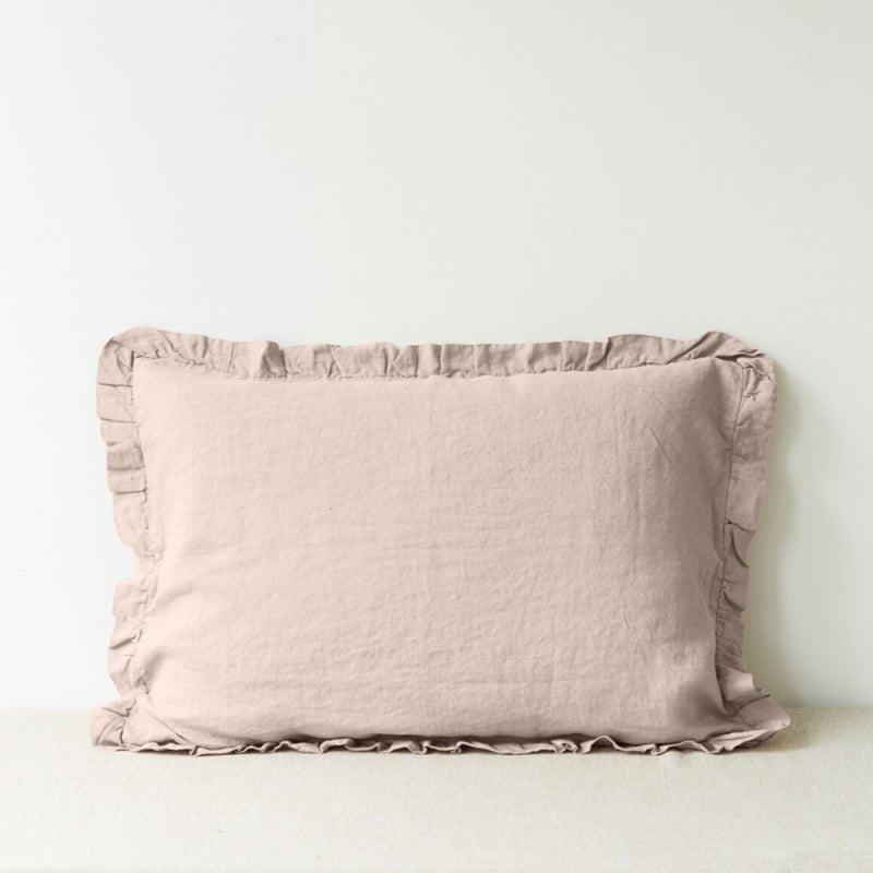 14. Beige linen pillowcase with frills on a neutral background, classic and timeless design