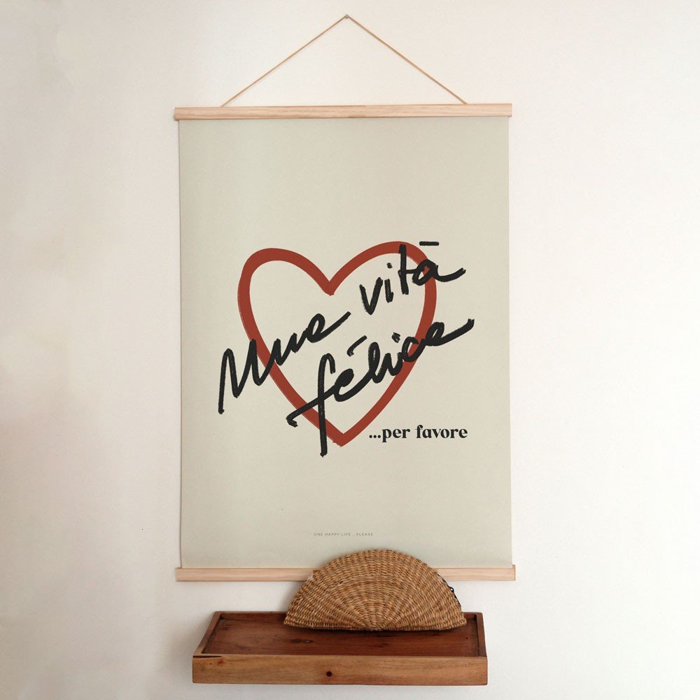 1. Terra Mamma Vita Felice poster with heart and Italian text hanging on a wall with wooden frame, minimalist design