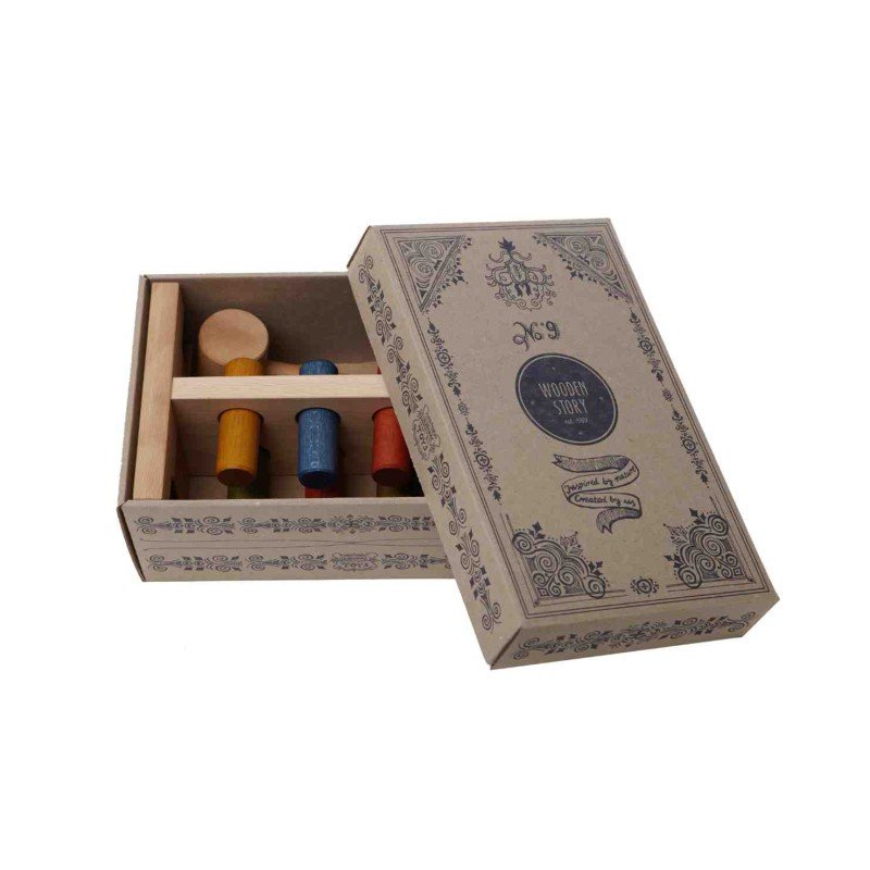 4. Wooden Story pounding bench in open decorative cardboard box with pegs and hammer