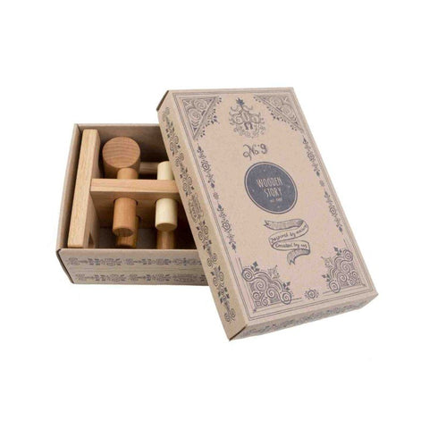 3. Open recyclable cardboard box showing Wooden Story Pounding Bench and hammer inside