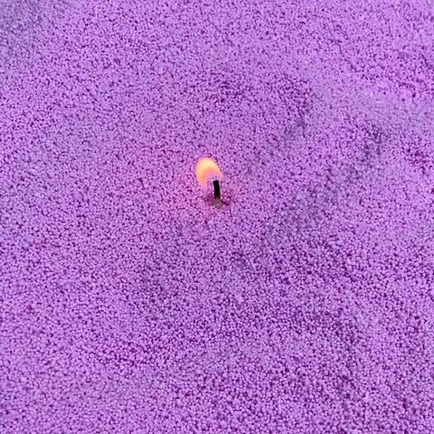 4. Close-up of lilac Candledust with lit wick