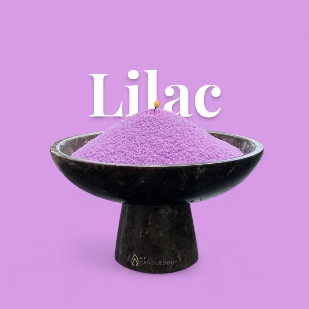 3. Lilac Candledust in black bowl with lit wick on purple background