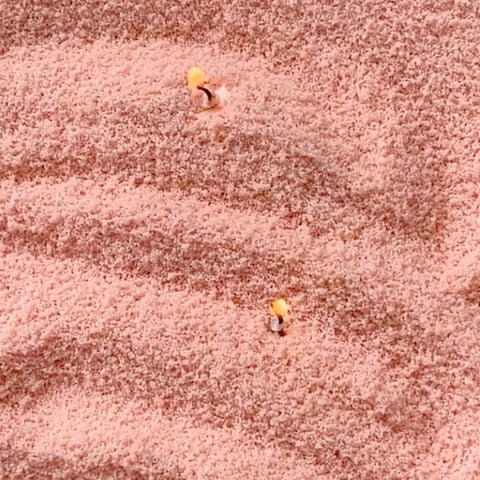 3. Close-up of unscented peach candle sand with visible wicks, highlighting texture and color