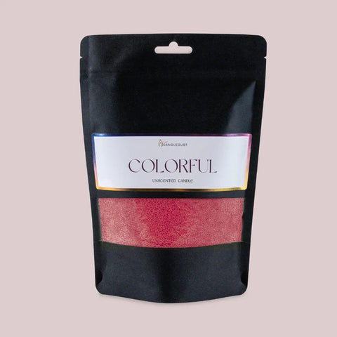 3. Black package of Candledust raspberry candle sand with colorful label on light background