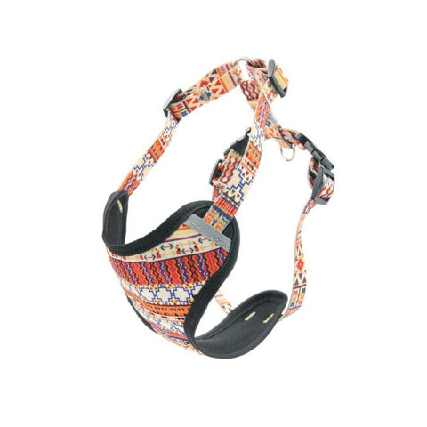 1. Boho-style dog harness with colorful geometric pattern, featuring adjustable straps and reflective elements, shown in studio setting