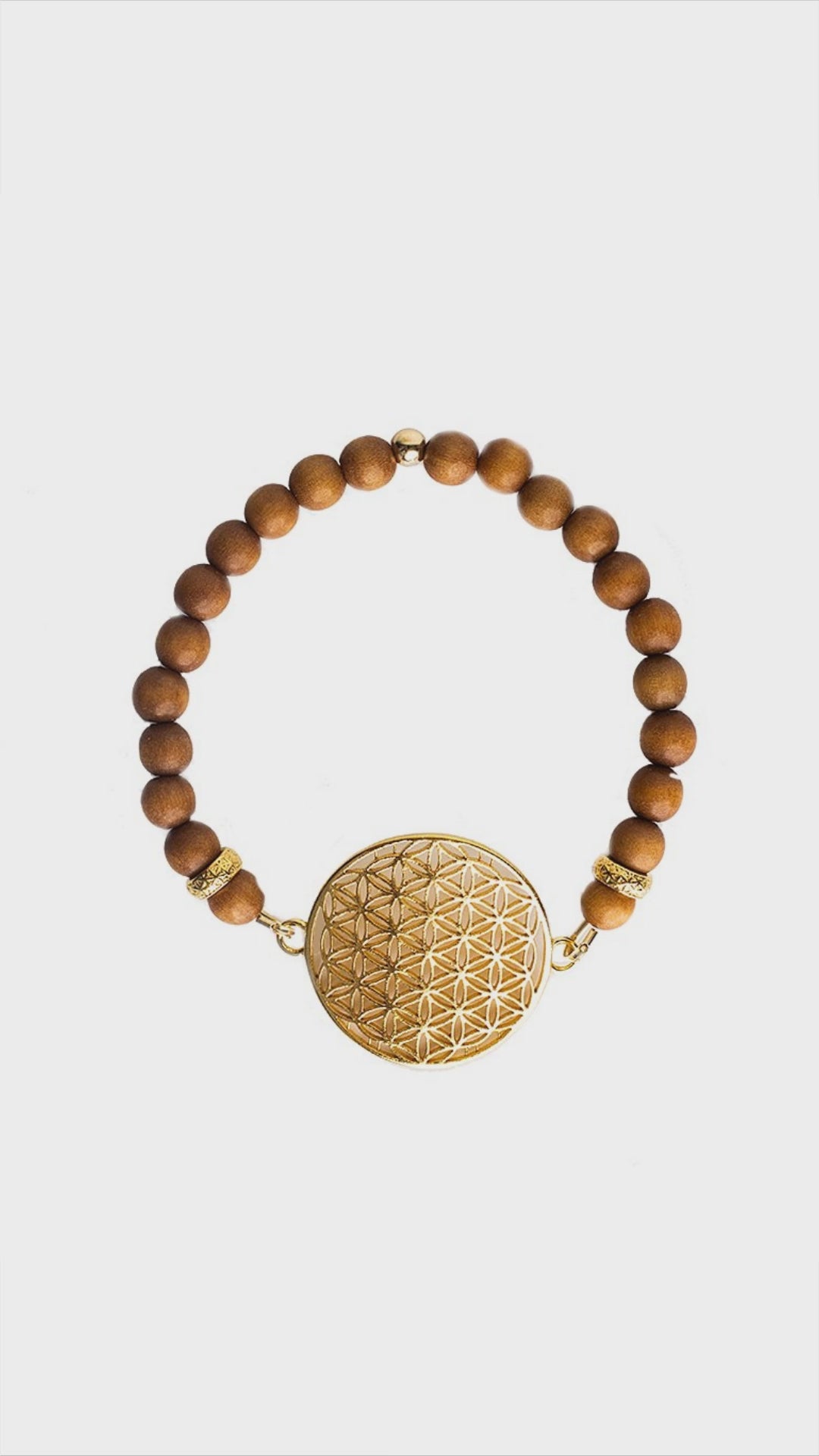 ✨ Ready to feel connected? Discover the beauty and balance of the Flower Of Life Bracelet. Designed with sandalwood and adorned in 925 silver and gold, every detail speaks elegance. Feel the allure of Estonia's craftsmanship wrapped around your wrist. This bracelet isn't just an accessory; it's an experience. Let it be your daily companion, a subtle whisper of positivity and connection. Don't miss out—this bestseller is a keeper. Dive into the serenity. Find the bracelet you deserve, link in bio