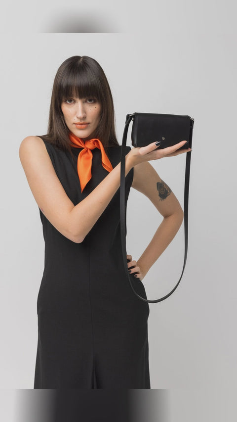 🖤 What if your whole day fit in one slick minibag? Meet KORA by PYKOK: compact, structured, hands-free. Minimal black leather with a soft-snap magnetic closure fits phone, keys, and cards, handmade in Lithuania for a refined European finish. PYKOK Crossbody Style it with a black dress or a bold scarf, it just works. Save for outfit inspo and head to link in bio. Handbags Bestseller