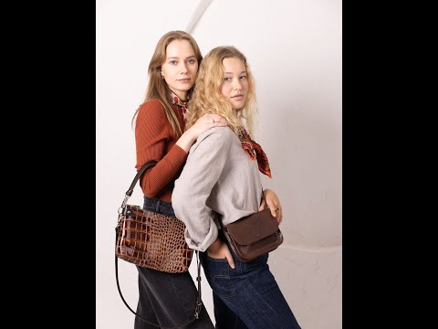 ✨ Effortless style with the RubyPurse by TOKSVISOKS! Stay chic on the go with this stunning brown marble CrossbodyBag. Perfect for any occasion! 🤎 Discover more: https://nooredx.eu/products/ruby-purse-brown-marble Fashion SustainableFashion YoungFashion Europe