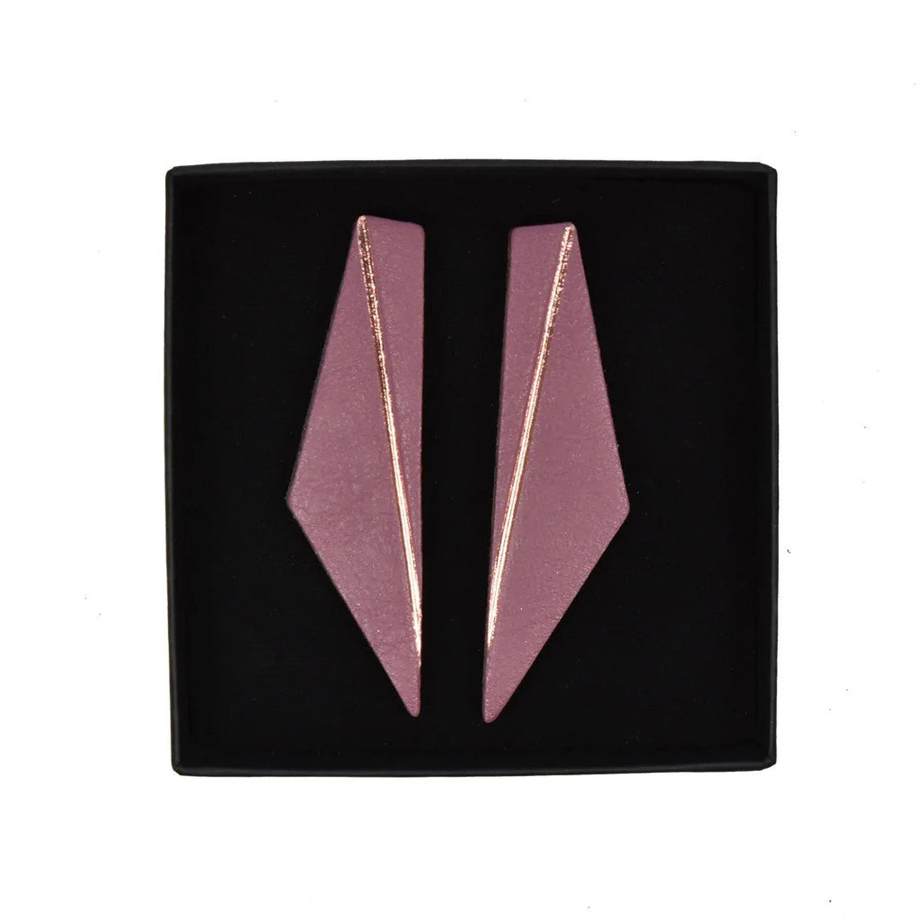 2. Lühikesed Wing earrings in pink by Gerda Retter Design, displayed in black box, showcasing geometric design and handcrafted leather