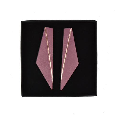 2. Lühikesed Wing earrings in pink by Gerda Retter Design, displayed in black box, showcasing geometric design and handcrafted leather
