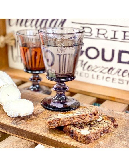8. Two eggplant purple La Rochère Bee Glasses on a wooden board with cheese and crackers