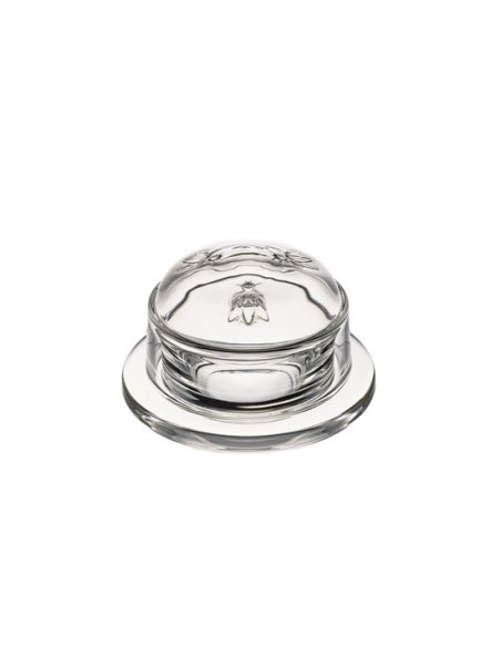 4. Studio shot of transparent glass butter dish with embossed bee design