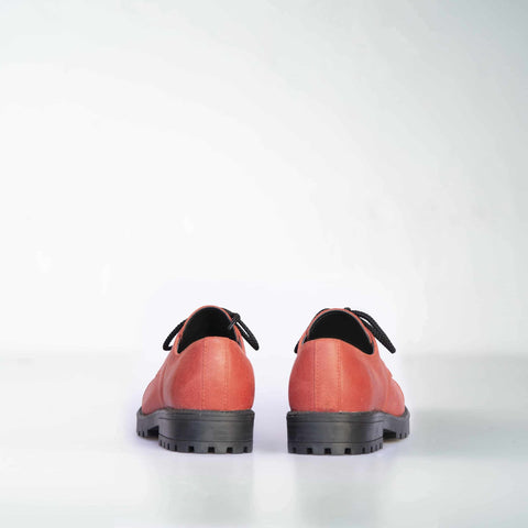 3. Back view of unisex red leather sneakers by Samelin, highlighting sturdy construction and black laces