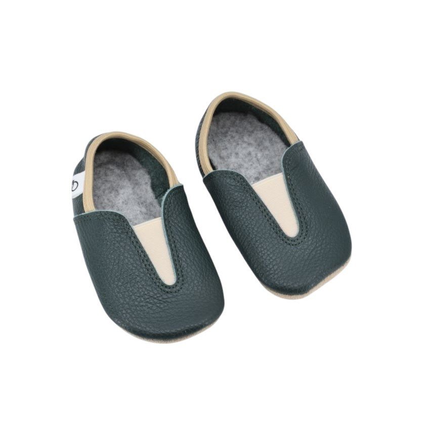 2. Studio image of Hip-Hop Punsa Kids Barefoot Slippers in dark green, showing upcycled leather and elastic upper