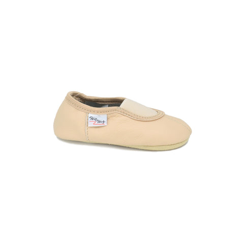 3. Side view of kids' beige leather slipper by Hip-Hop, highlighting elastic band and felt insole