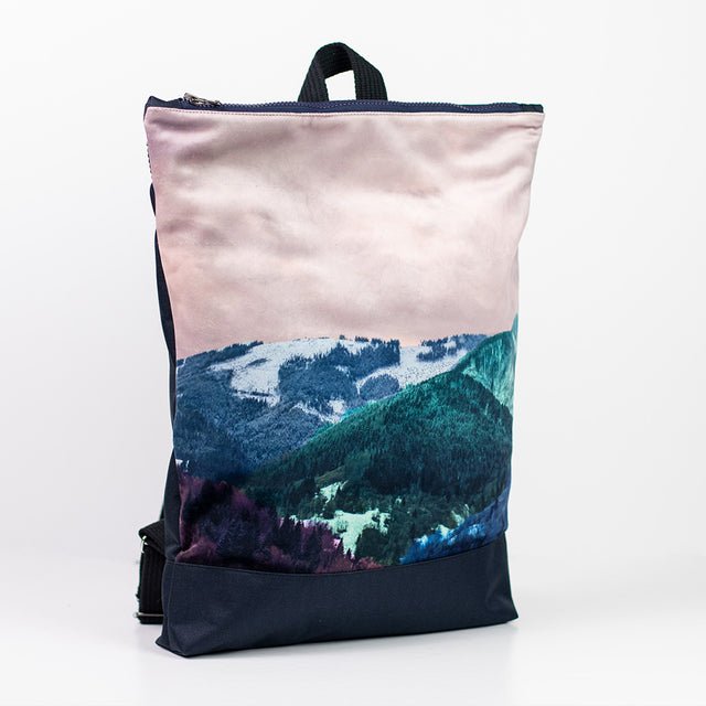 3. Side view of Muni Blue Mountains backpack highlighting velvet fabric and sturdy polyester