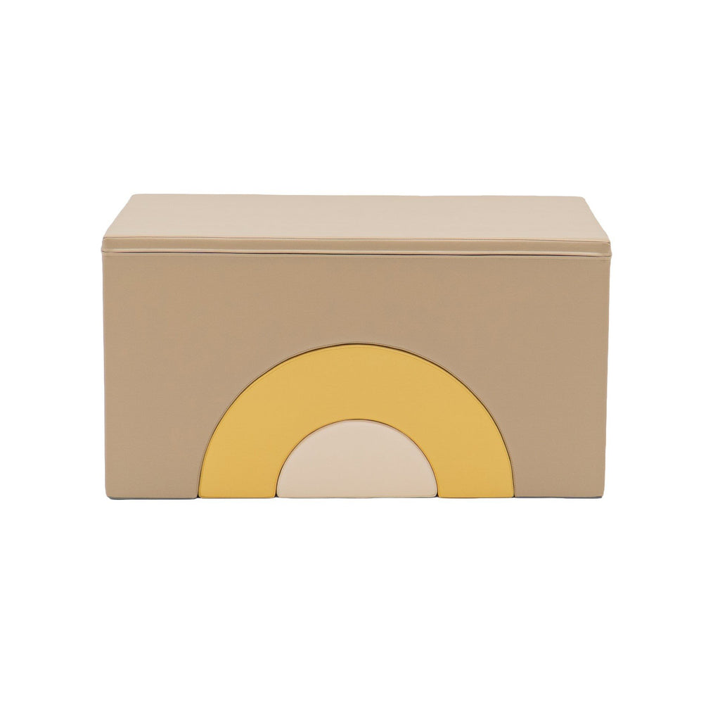 2. Front view of beige and honey soft play block with rainbow design, studio background