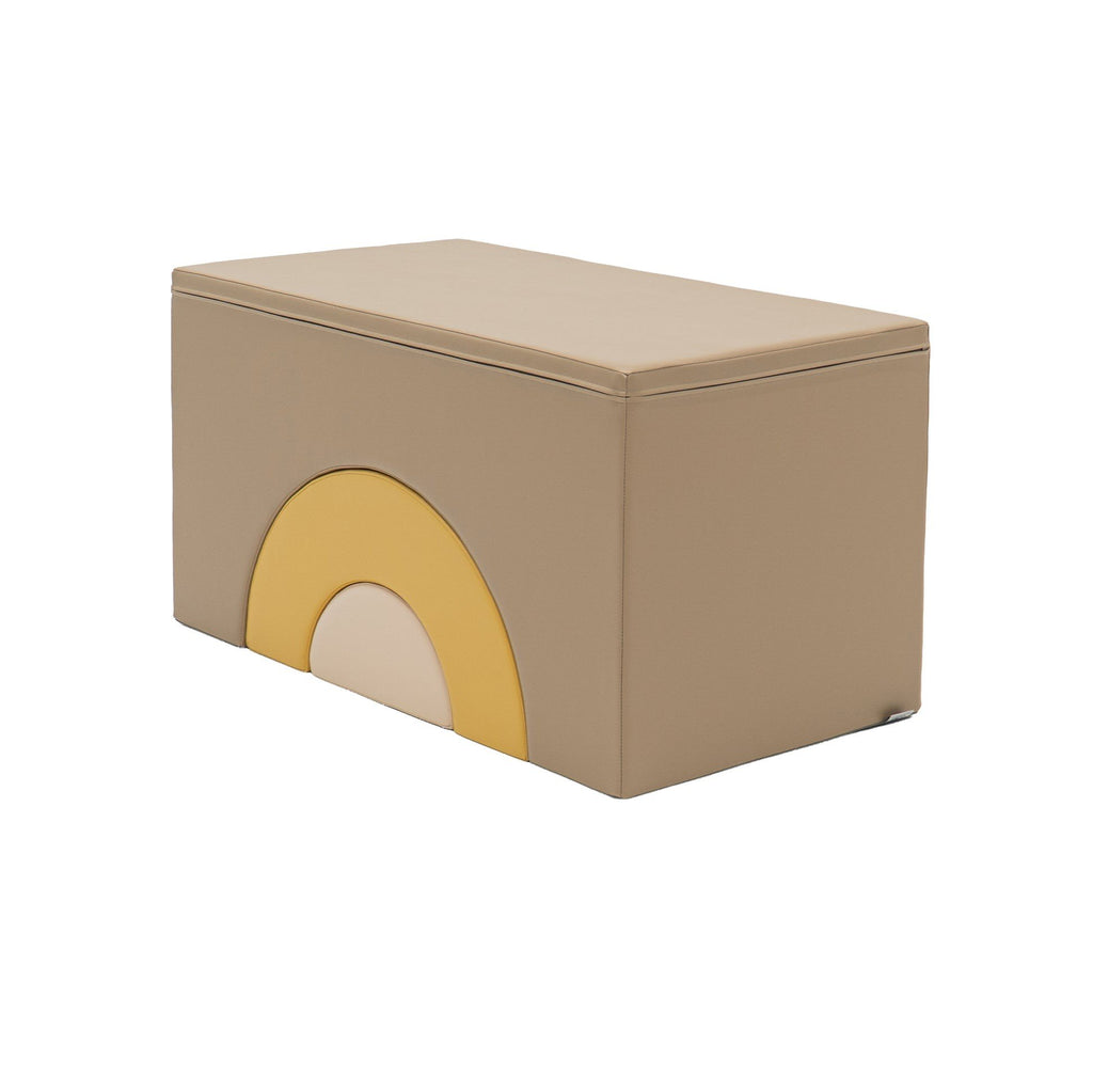 2. Beige and honey soft play block with rainbow design on side, shown in studio setting