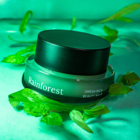 1. Usva Cosmetics Rainforest Omega Rich Beauty Balm in green jar surrounded by leaves, highlighting natural ingredients