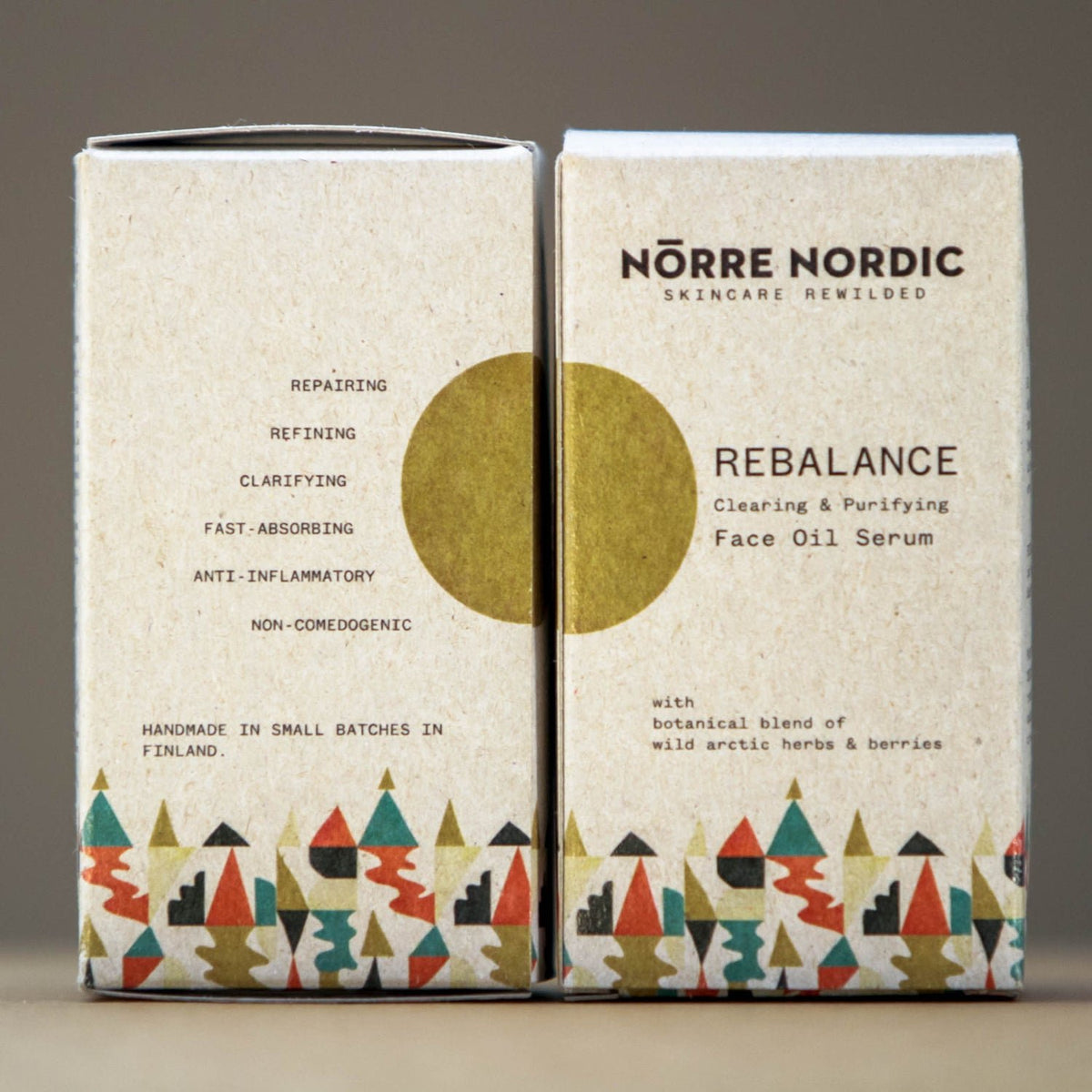 3. Close-up of Nörre Nordic REBALANCE Face Oil Serum packaging with product benefits