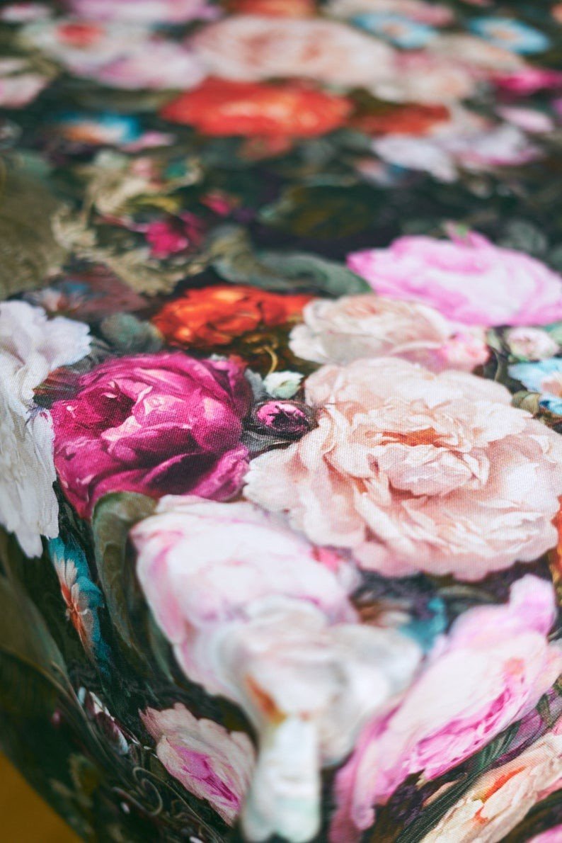 3. Detailed view of Francine Black tablecloth highlighting pink and orange floral pattern on cotton fabric
