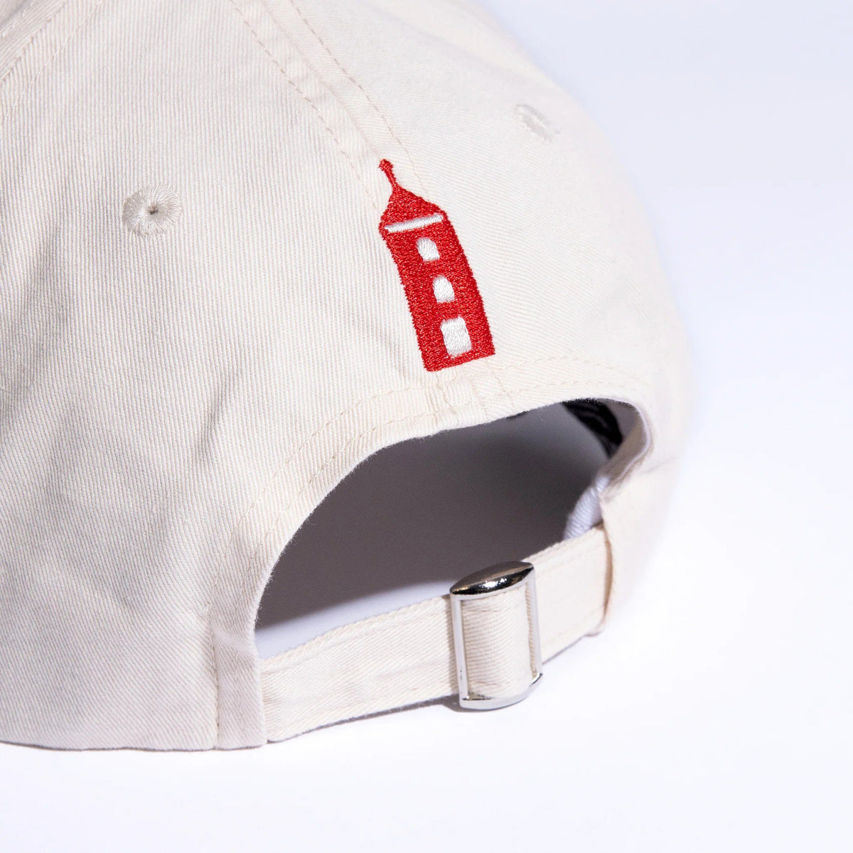 2. Back view of Moomin by NordicBuddies Red Cross Adult Cap showing adjustable strap and red embroidery, studio shot