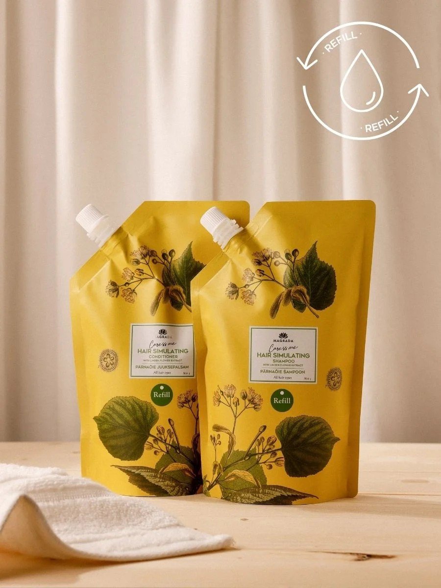 5. Two Magrada Organic Cosmetics Linden Flower Shampoo refill packs with Nordic Birch Extract, 500ml, on a wooden surface