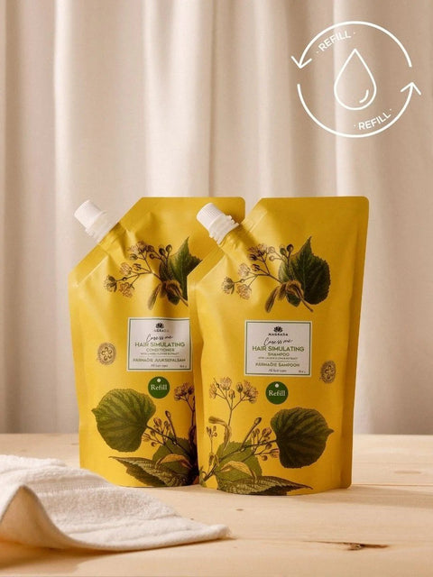 5. Two Magrada Organic Cosmetics Linden Flower Shampoo refill packs with Nordic Birch Extract, 500ml, on a wooden surface