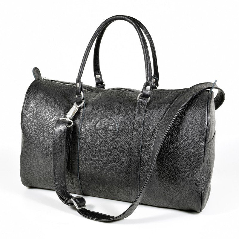 1. Papillon black leather travel bag 20L with detachable shoulder strap, shown in studio setting
