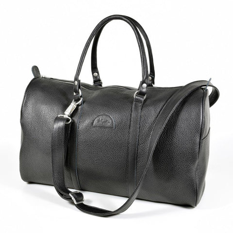 1. Papillon black leather travel bag 20L with detachable shoulder strap, shown in studio setting